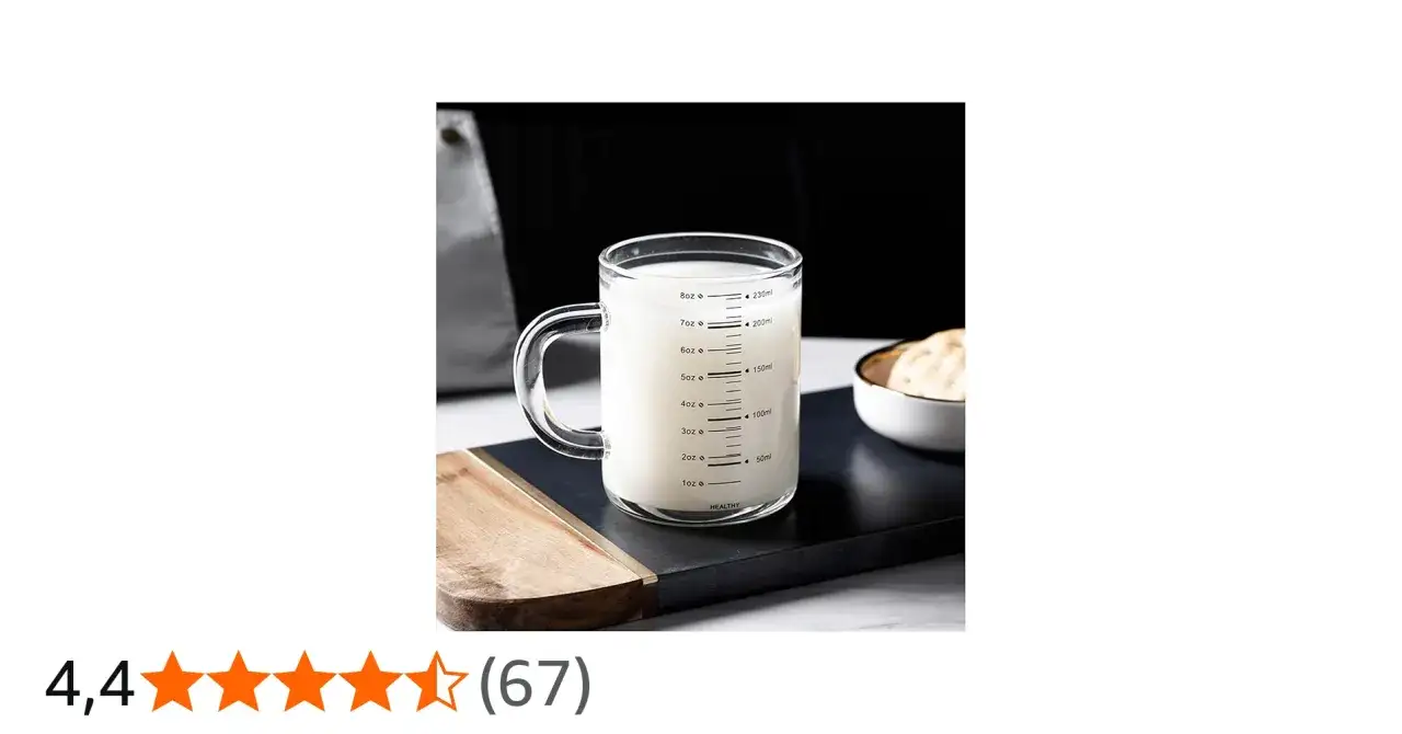 Szklanka z miarką pokazuje, ile szklanka ma mililitrów wody. Widać na niej oznaczenia od 50 ml do 230 ml.